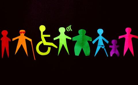A group of colourful paper cutouts on a black background representing individuals with different disabilities